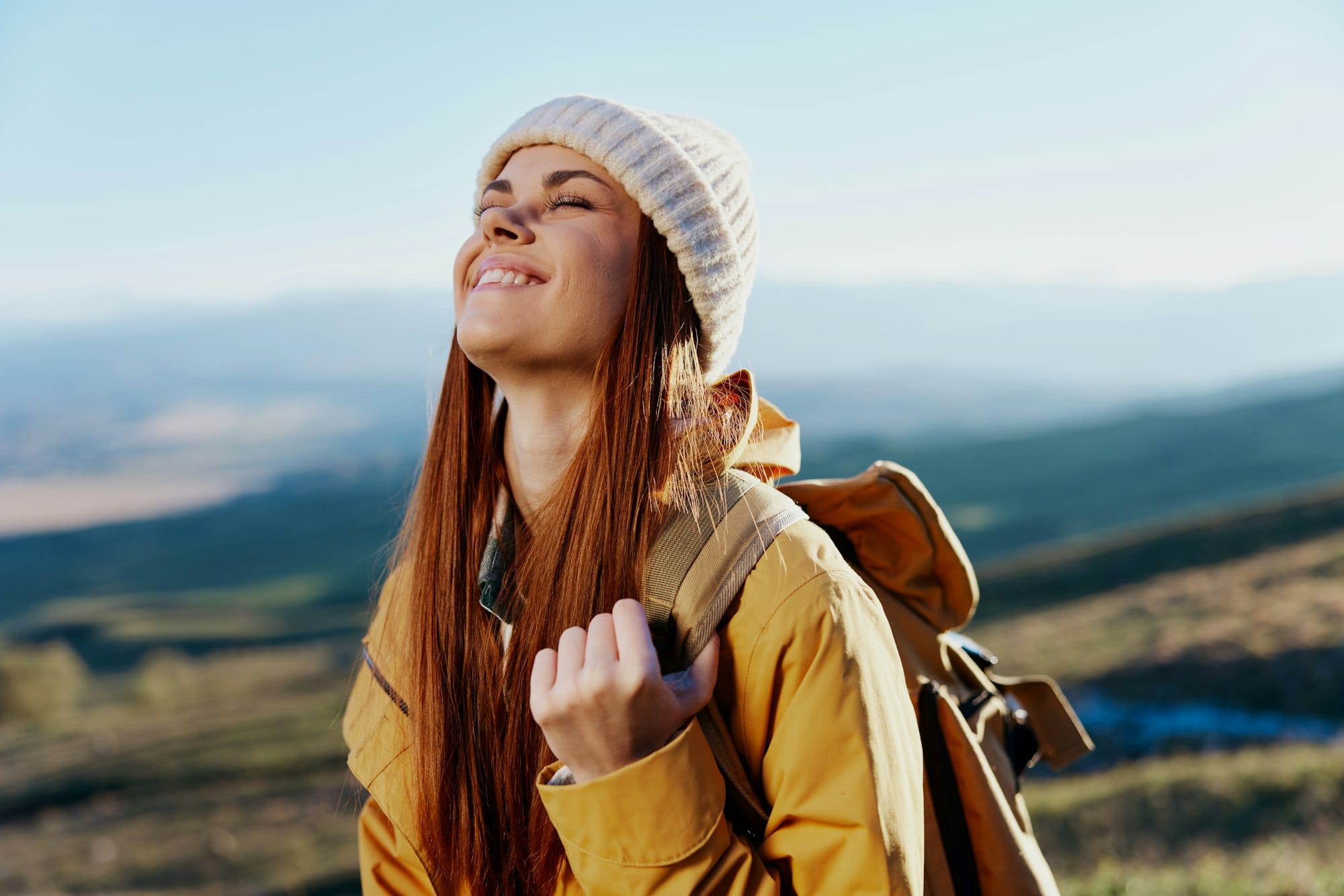 woman tourist admiring the landscape mountains nature Fresh air
